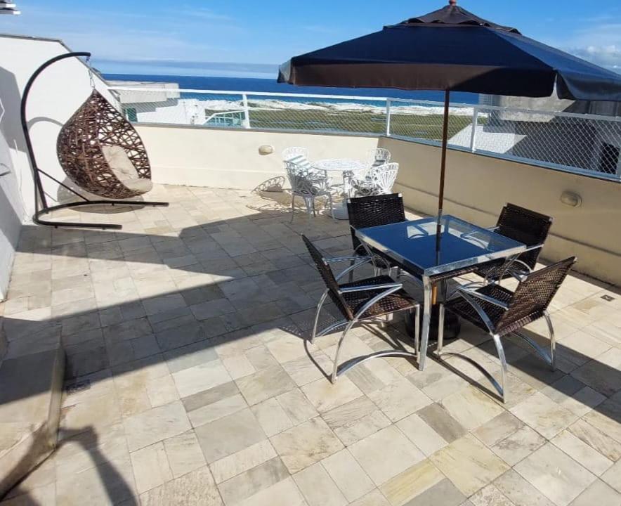 Triplex Cabo Frio Apartment Luaran gambar