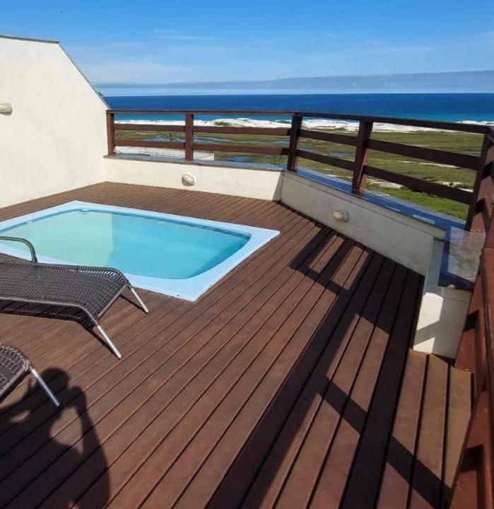 Triplex Cabo Frio Apartment Luaran gambar